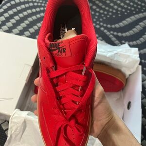 Nike Air Force one tans bottom and red all around size 10.5